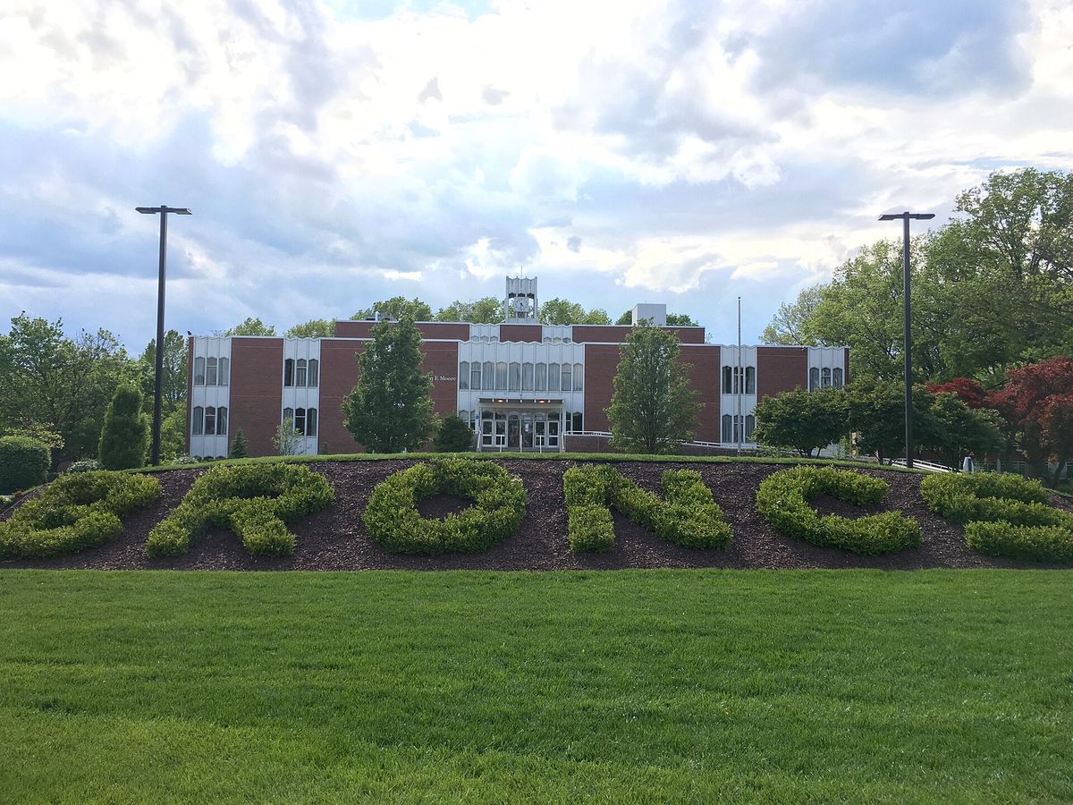The BRONC lettering in the hedges on Rider University's campus